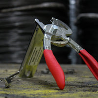 Manual hog ring pliers for the 09 gauge D style hog rings.