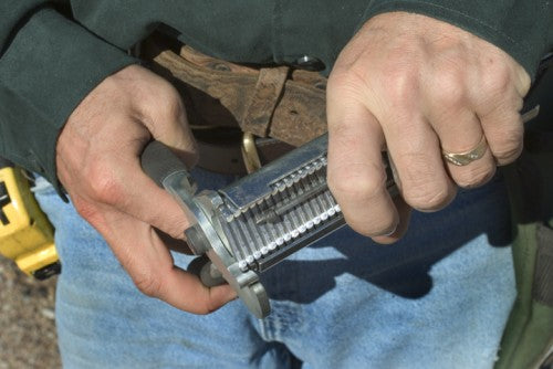 Manual hog ring pliers for the 09 gauge D style hog rings.