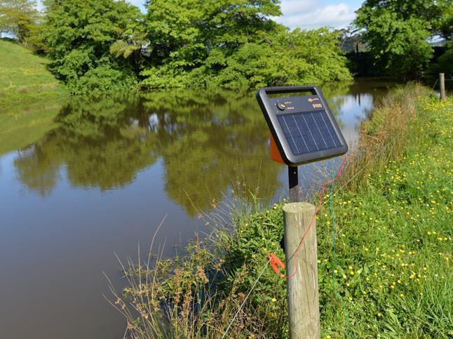 Gallagher S100 Portable Solar Fence Energizer Mounted To A Post