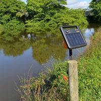 Gallagher S100 Portable Solar Fence Energizer Mounted To A Post